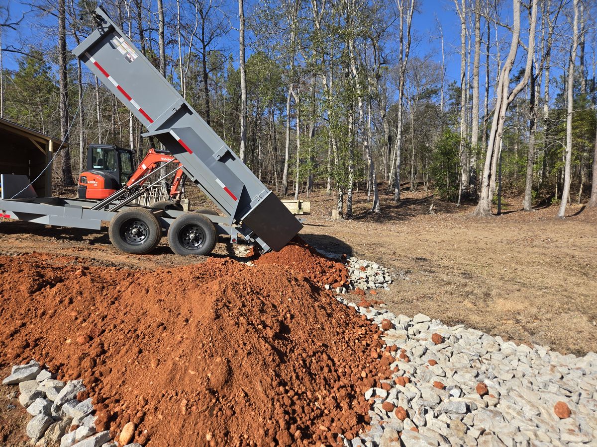 Adding clay gravel.